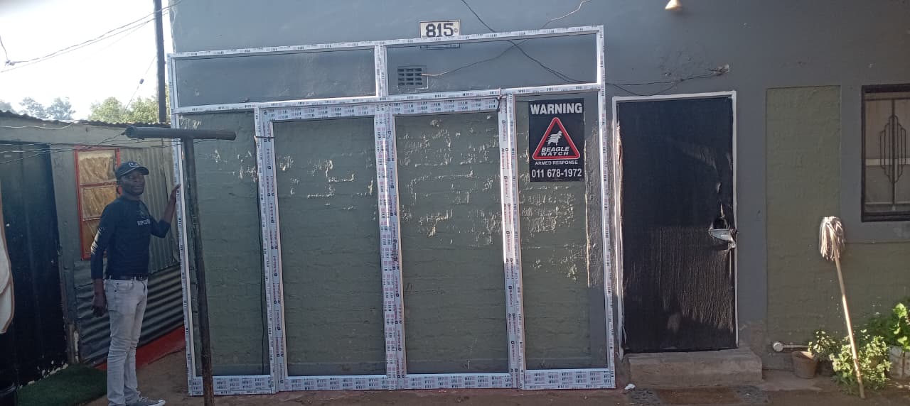 Custom aluminium shopfront frame prepared for installation